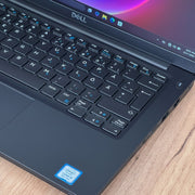 Laptopty black Dell Latitude 7390 laptop with Intel Core i5 8th Gen processor, showing keyboard and trackpad.