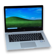 Серебристый ноутбук HP EliteBook X360 1030 G2 с 13,3-дюймовым экраном, клавиатурой и тачпадом.
